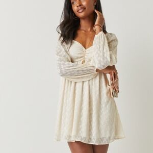 Francesca's Audrey Parks Gianna long sleeve jacquard open back mini dress